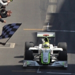 Jenson Button Crosses The Finish Line